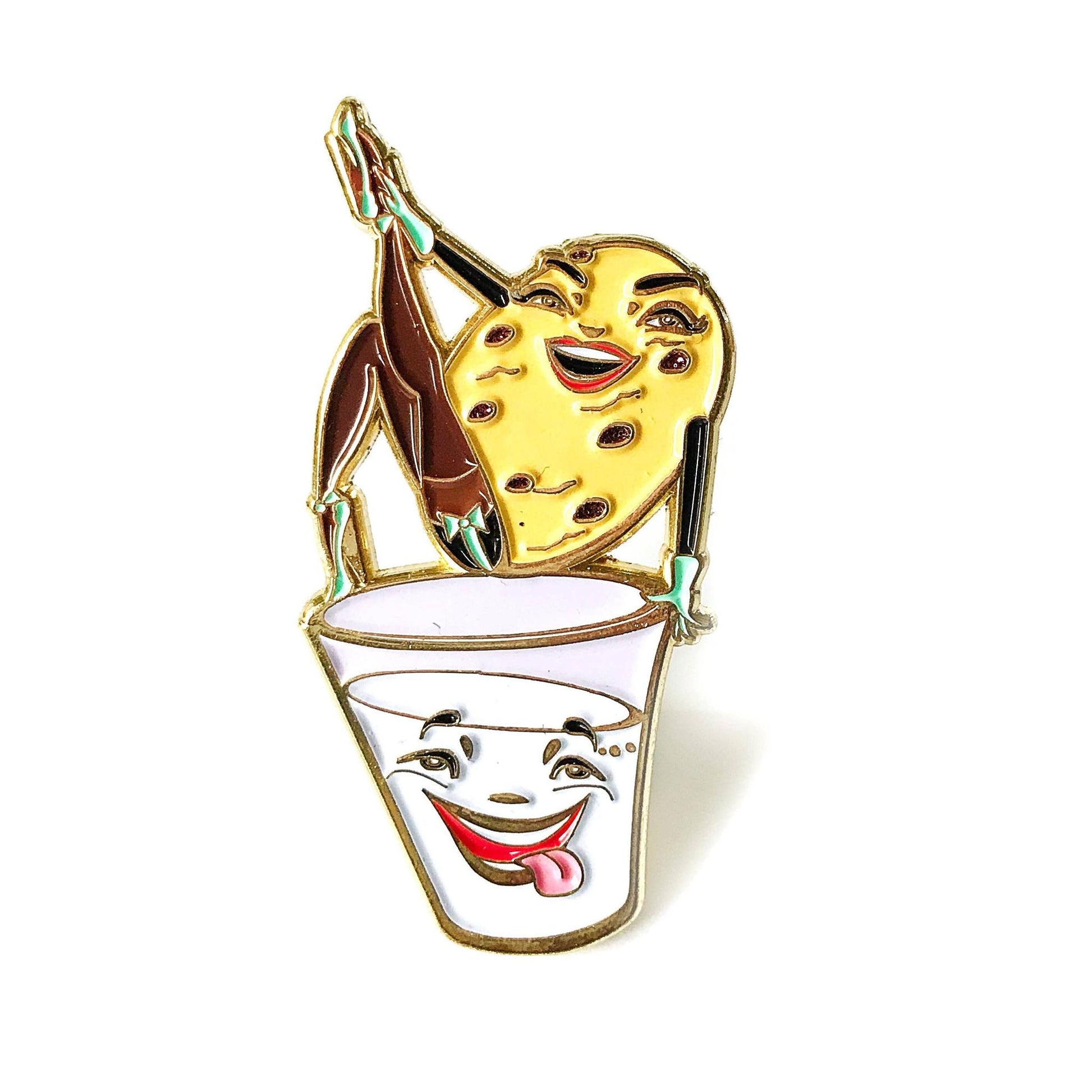 Pin with a smiling face on a cookie and milk design