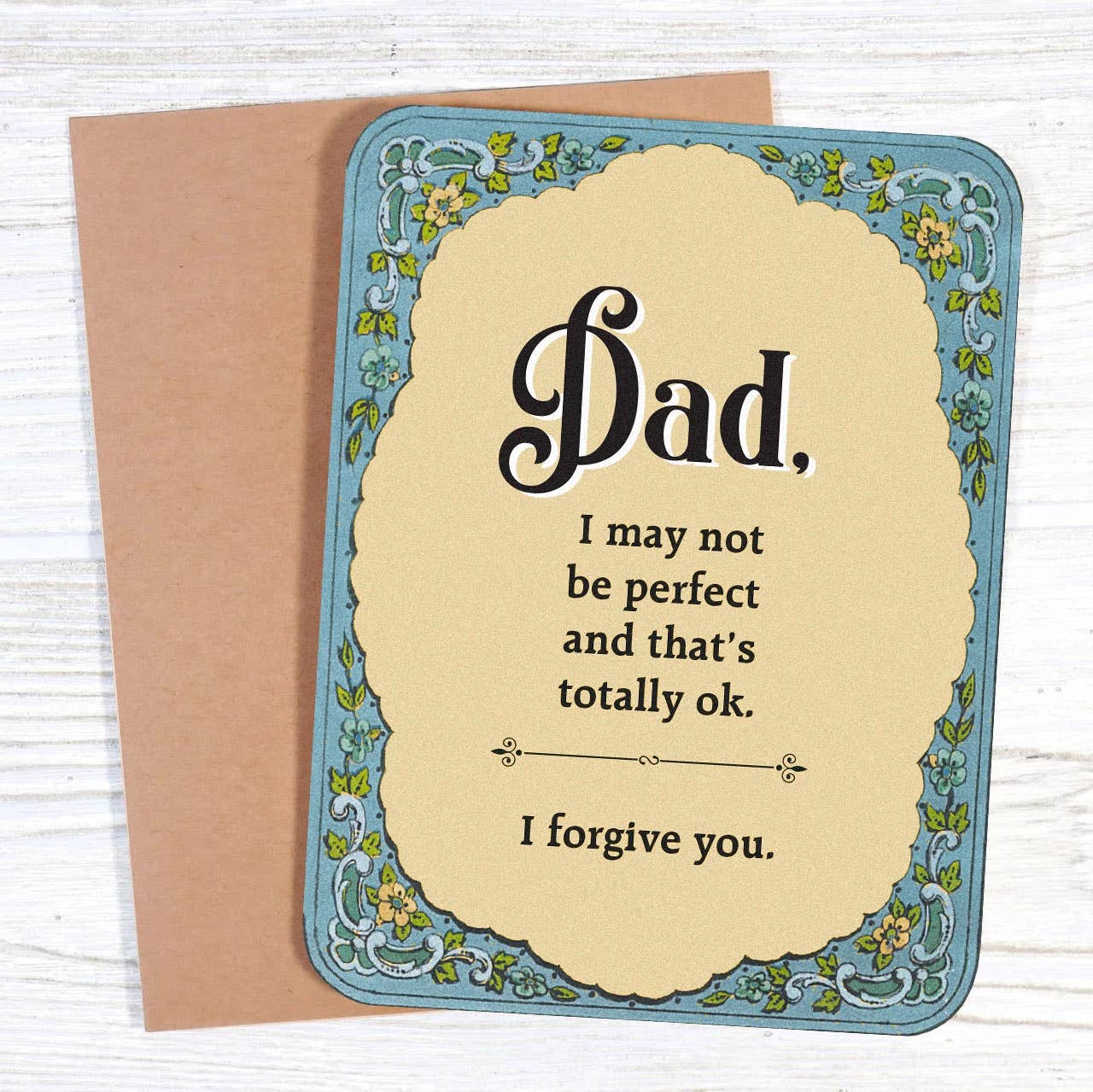 Greeting card for father with decorative border and message on a wooden surface