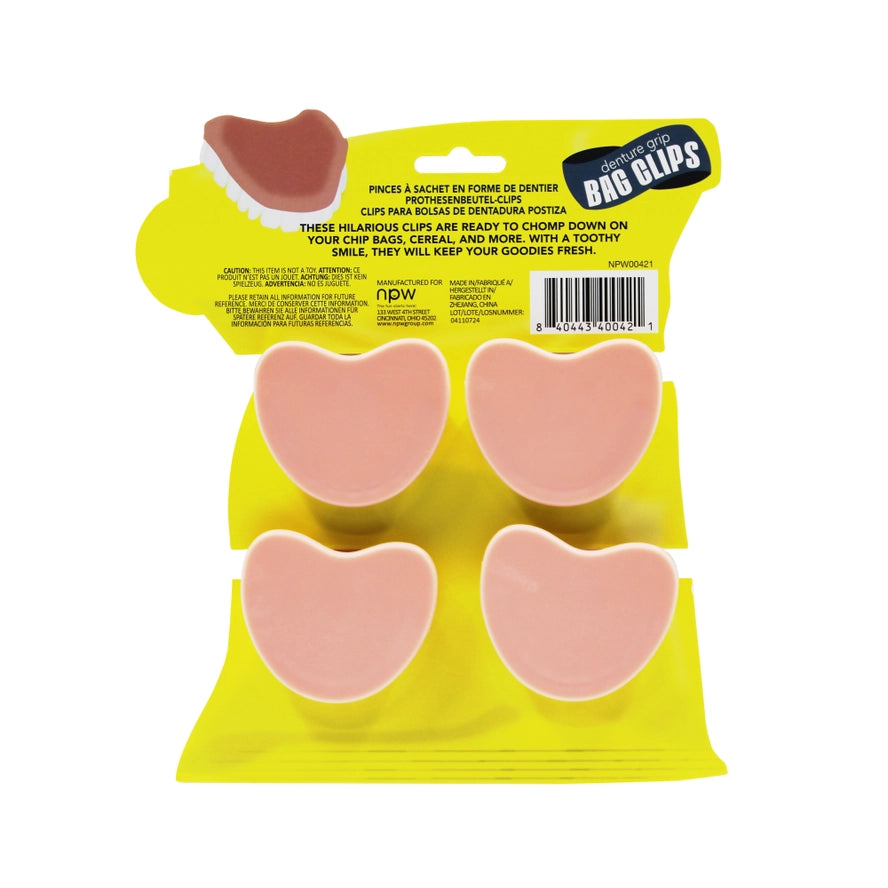 Pack of pink heart-shaped dental clips with yellow packaging