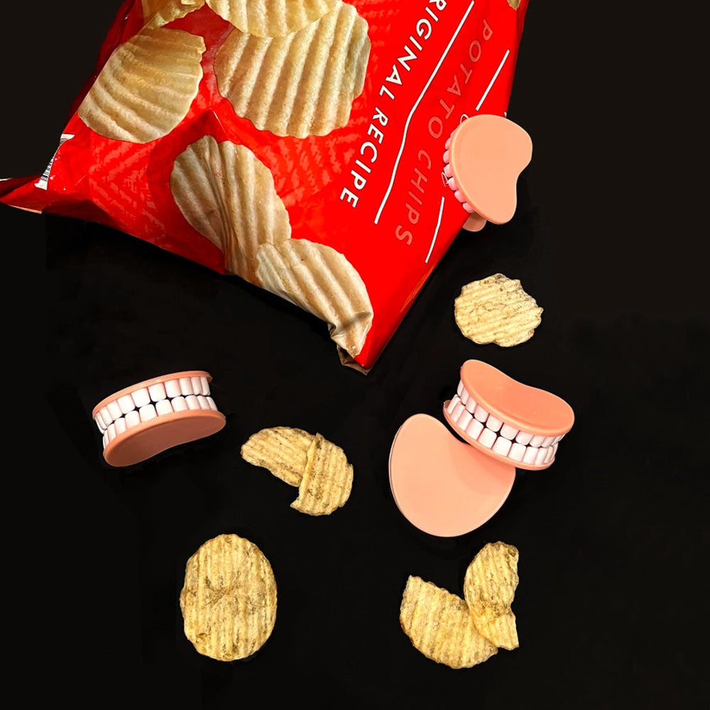 Red packet of potato chips and pink and white tooth clips