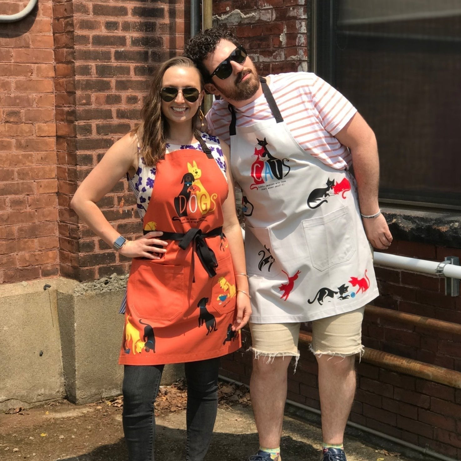 Dogs. Here To Remind You That Everything Is Exciting Funny Cooking and BBQ Apron Unisex 2 Pockets Adjustable Strap 100% Cotton | BlueQ at GetBullish