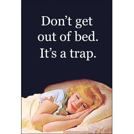 A dark navy graphic with the text 'Don’t get out of bed. It’s a trap.