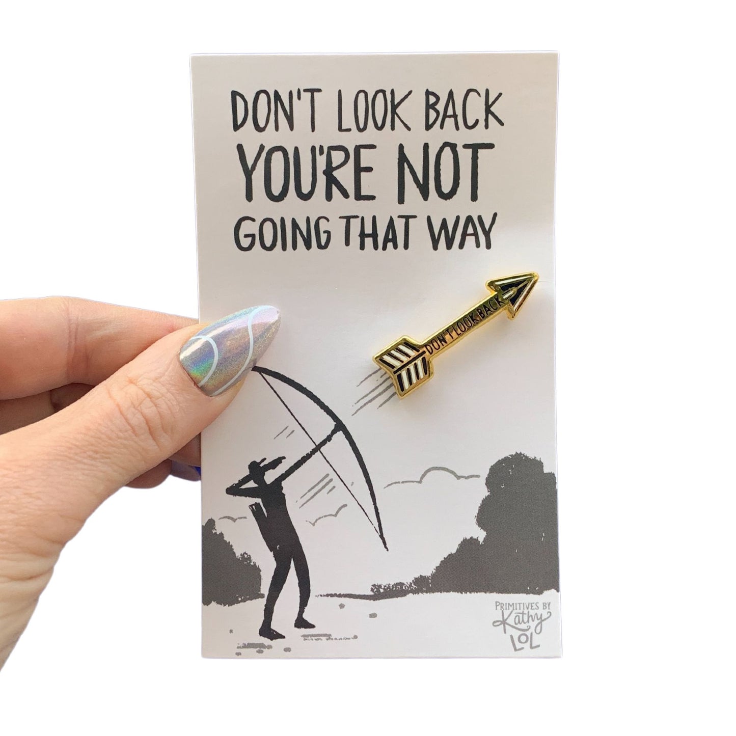 Don't Look Back Arrow Enamel Pin in Gold on Gift Card