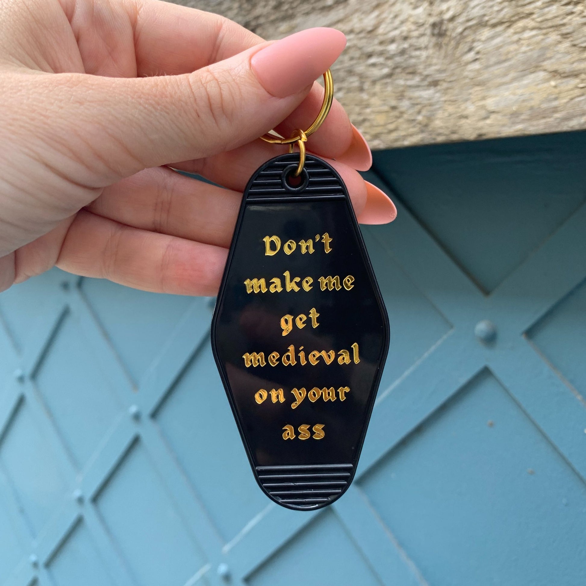 Don't Make Me Get Medieval on Your Ass Motel Style Keychain in Black