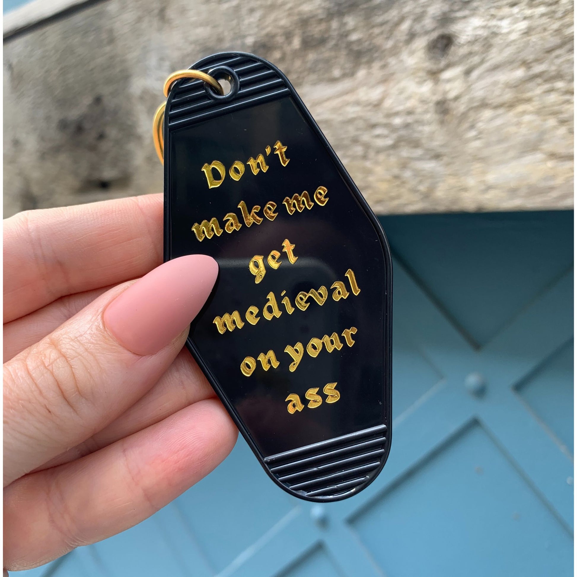 Don't Make Me Get Medieval on Your Ass Motel Style Keychain in Black