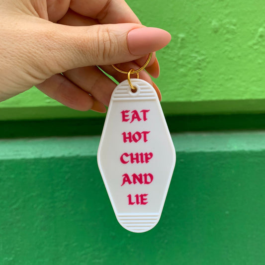 Eat Hot Chip and Lie Motel Style Keychain in White