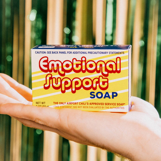 Box of 'Emotional Support Soap' held in a hand