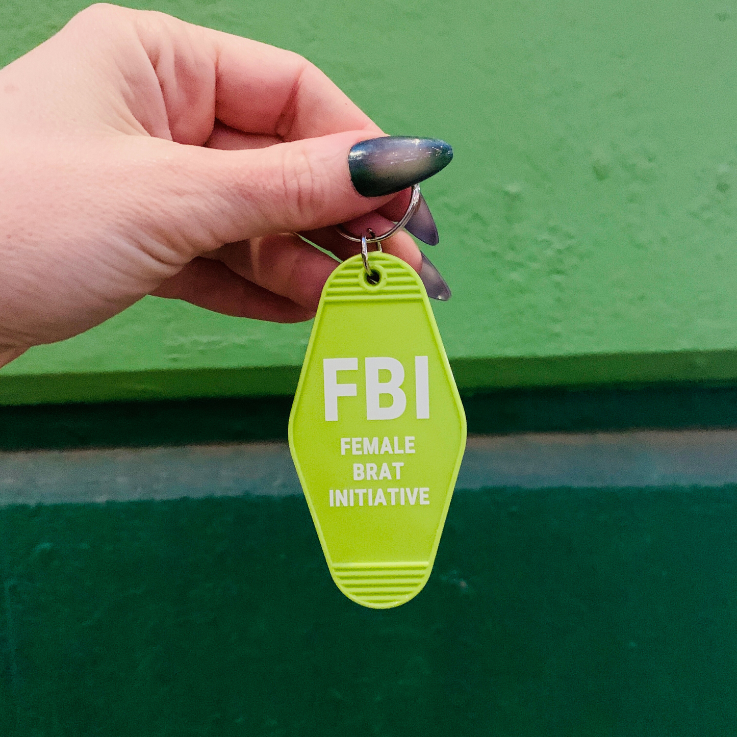 FBI Female Brat Initiative Motel Style Keychain in Green