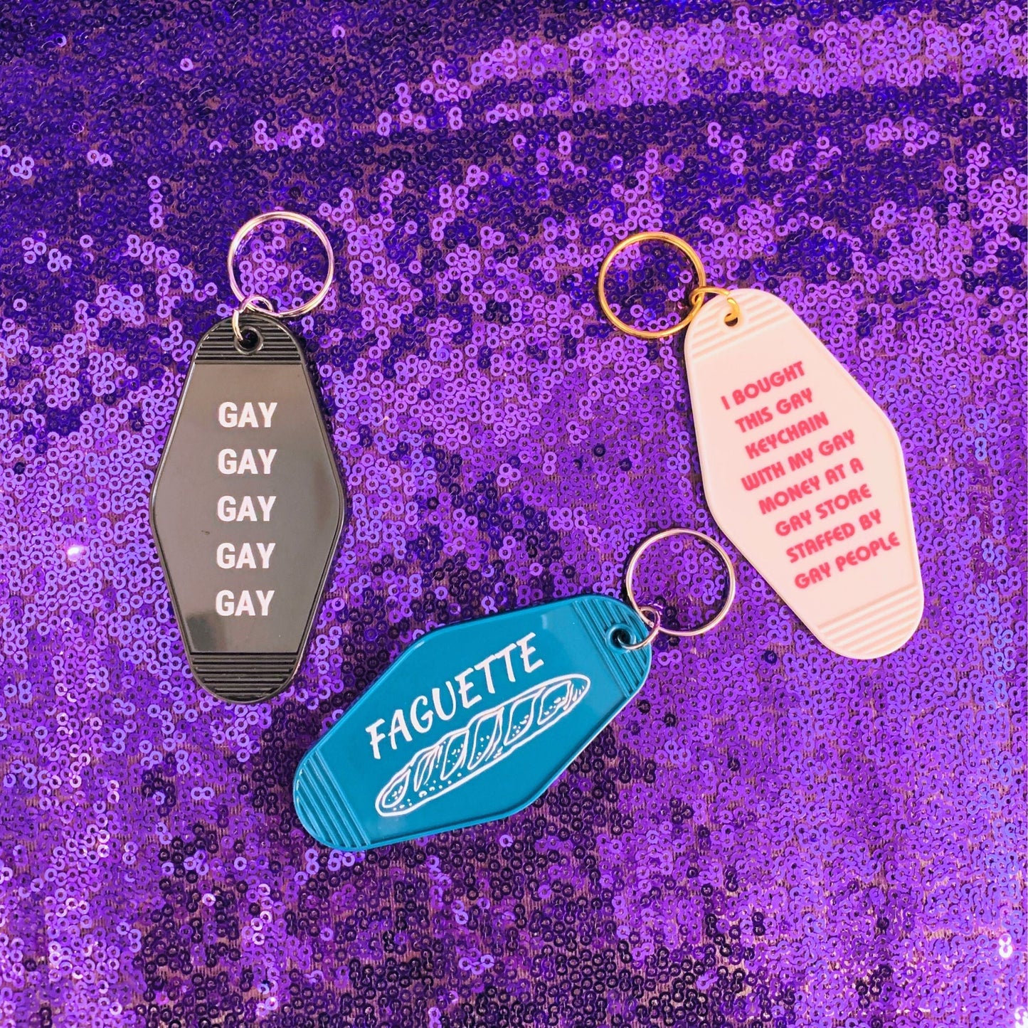 Faguette Gay Pride Motel Keychain with Baguette Bread Motif