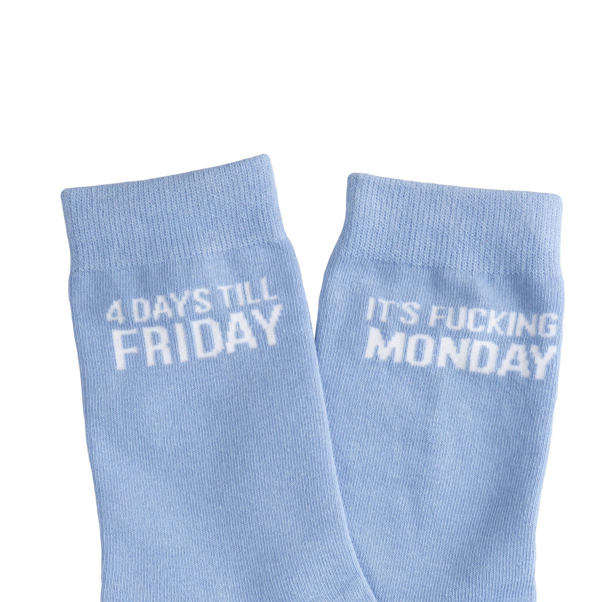 Light blue socks with text '4 days till Friday' and 'It's fucking Monday'