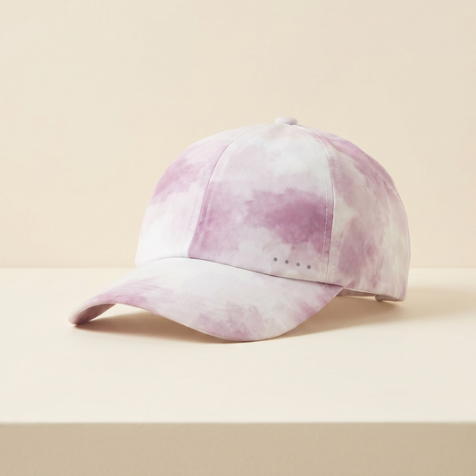 Pink and white tie-dye baseball cap on a beige background