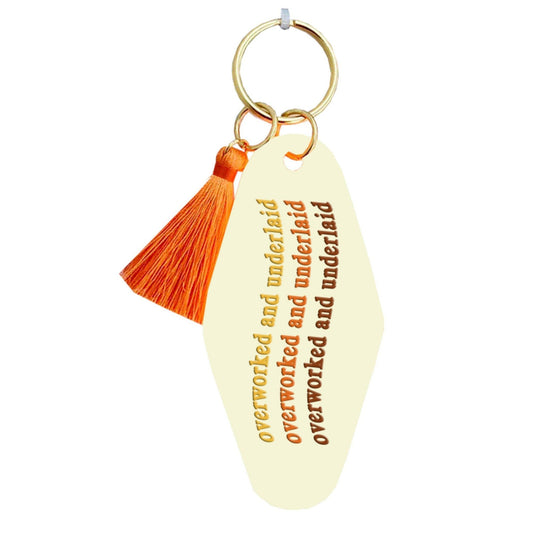 Fun Club Overworked And Underlaid Keychain with Orange Tassel