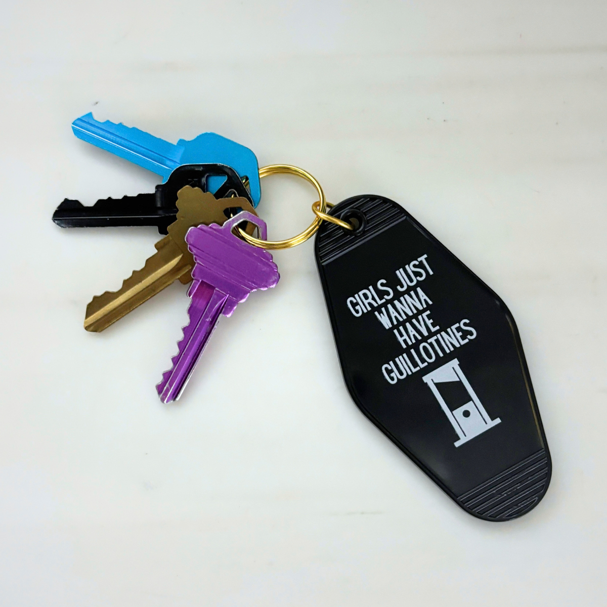 Girls Just Wanna Have Guillotines Motel Style Keychain in Black-GetBullish-The Bullish Store