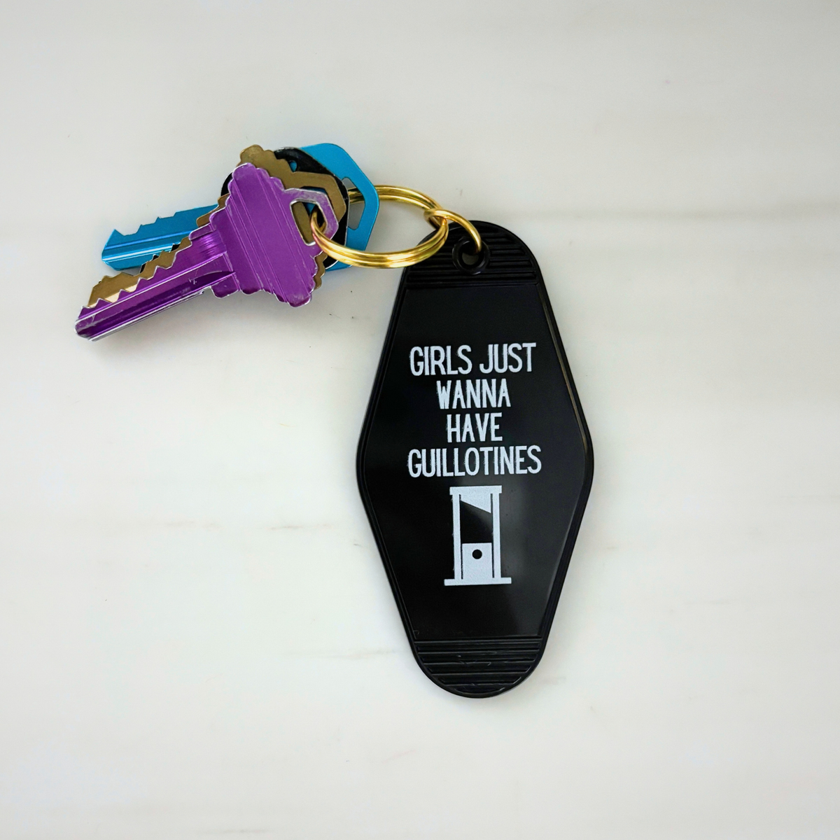 Girls Just Wanna Have Guillotines Motel Style Keychain in Black-GetBullish-The Bullish Store