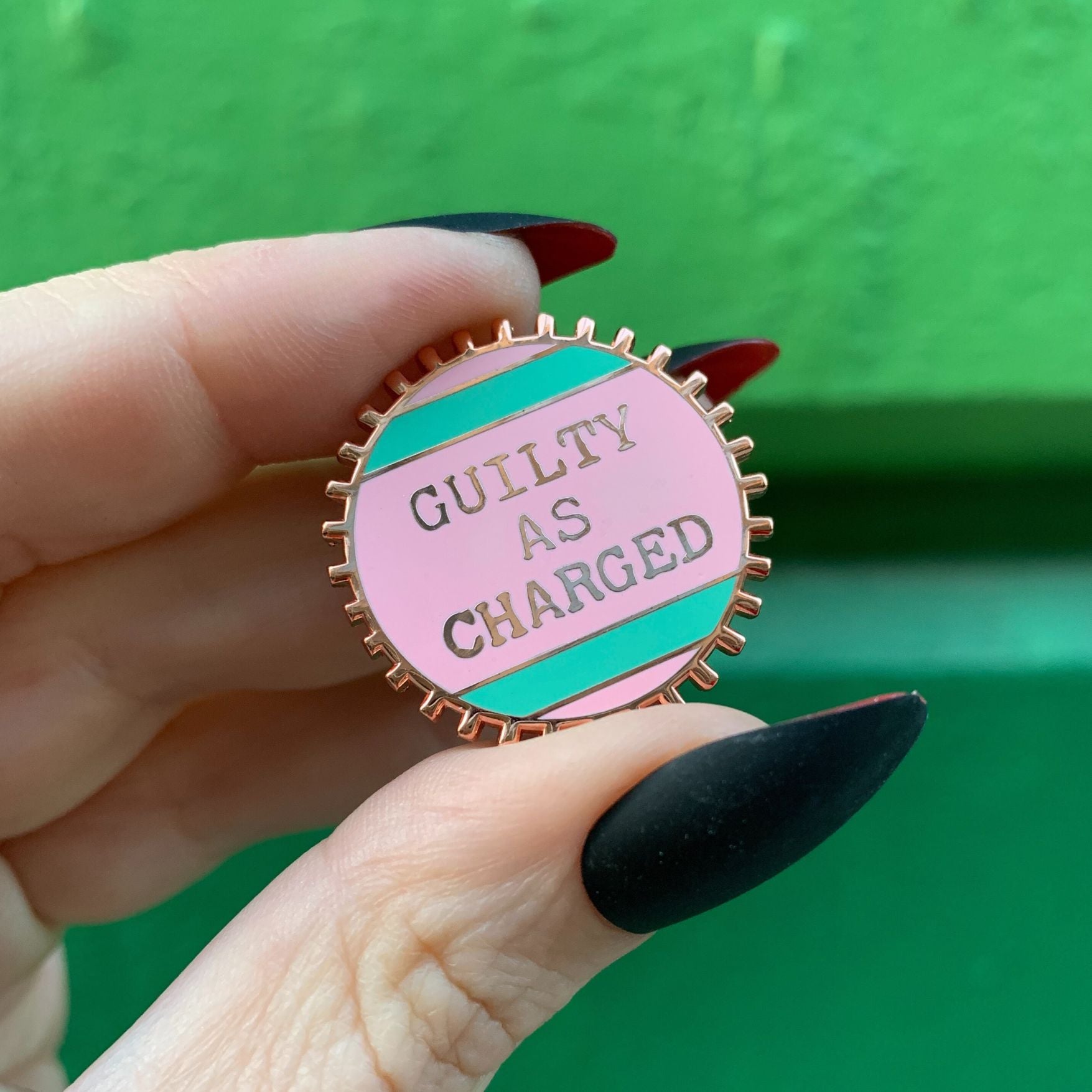 Guilty As Charged Pink and Mint Enamel Pin on Gift Card