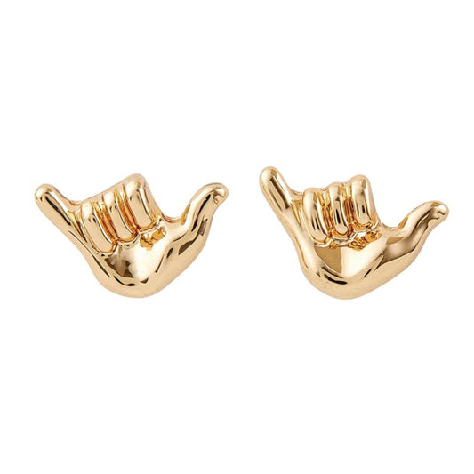 Gold hand-shaped earrings on a white background