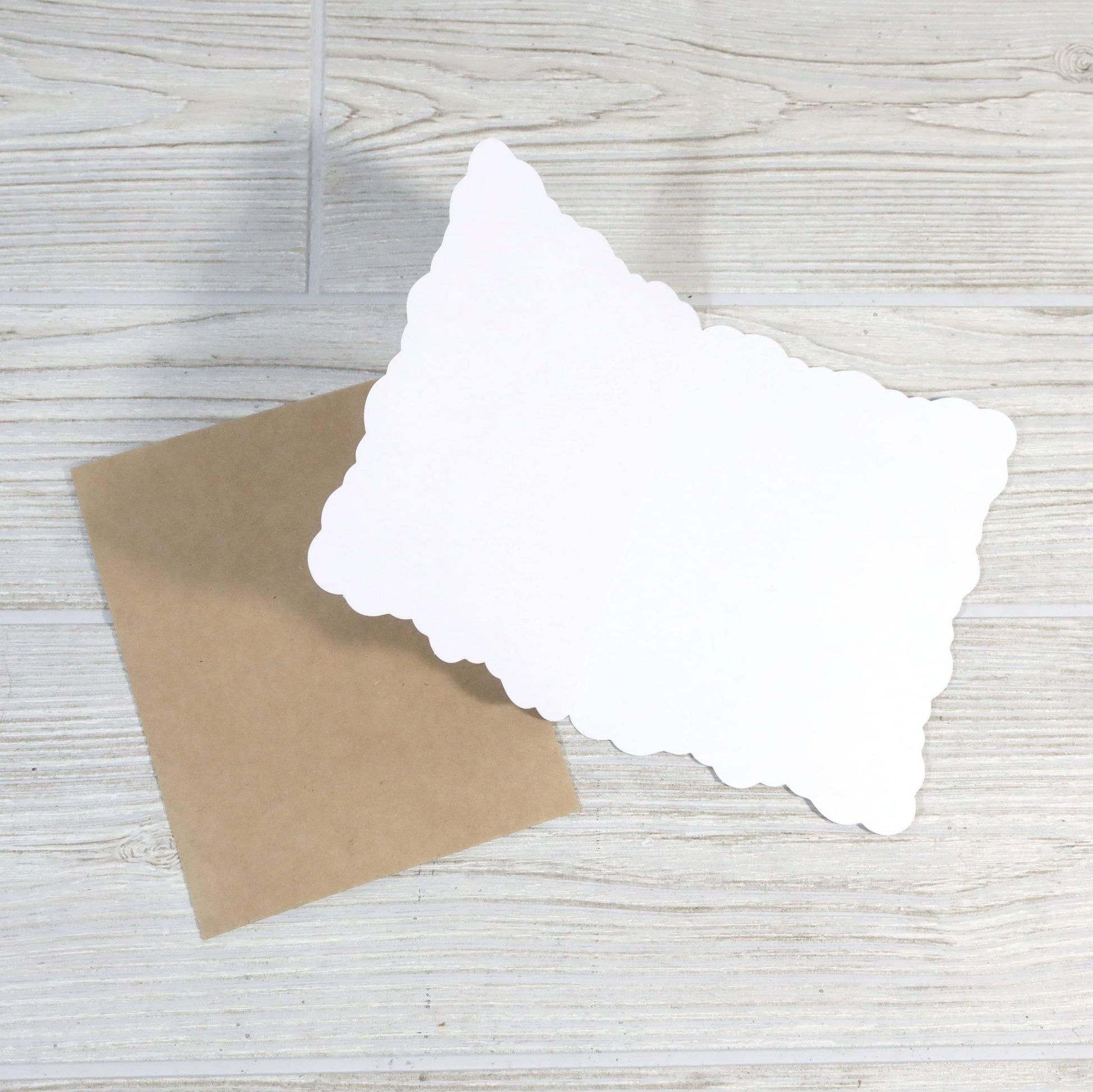 Inside of a blank greeting card with brown envelope