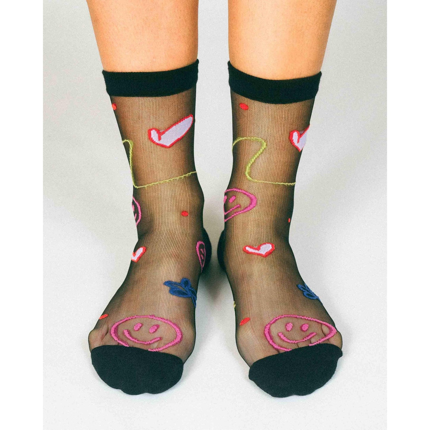 Happy Doodles Sheer Crew Socks by Hannah Packer | Women's Black Lightweight Graphic Socks