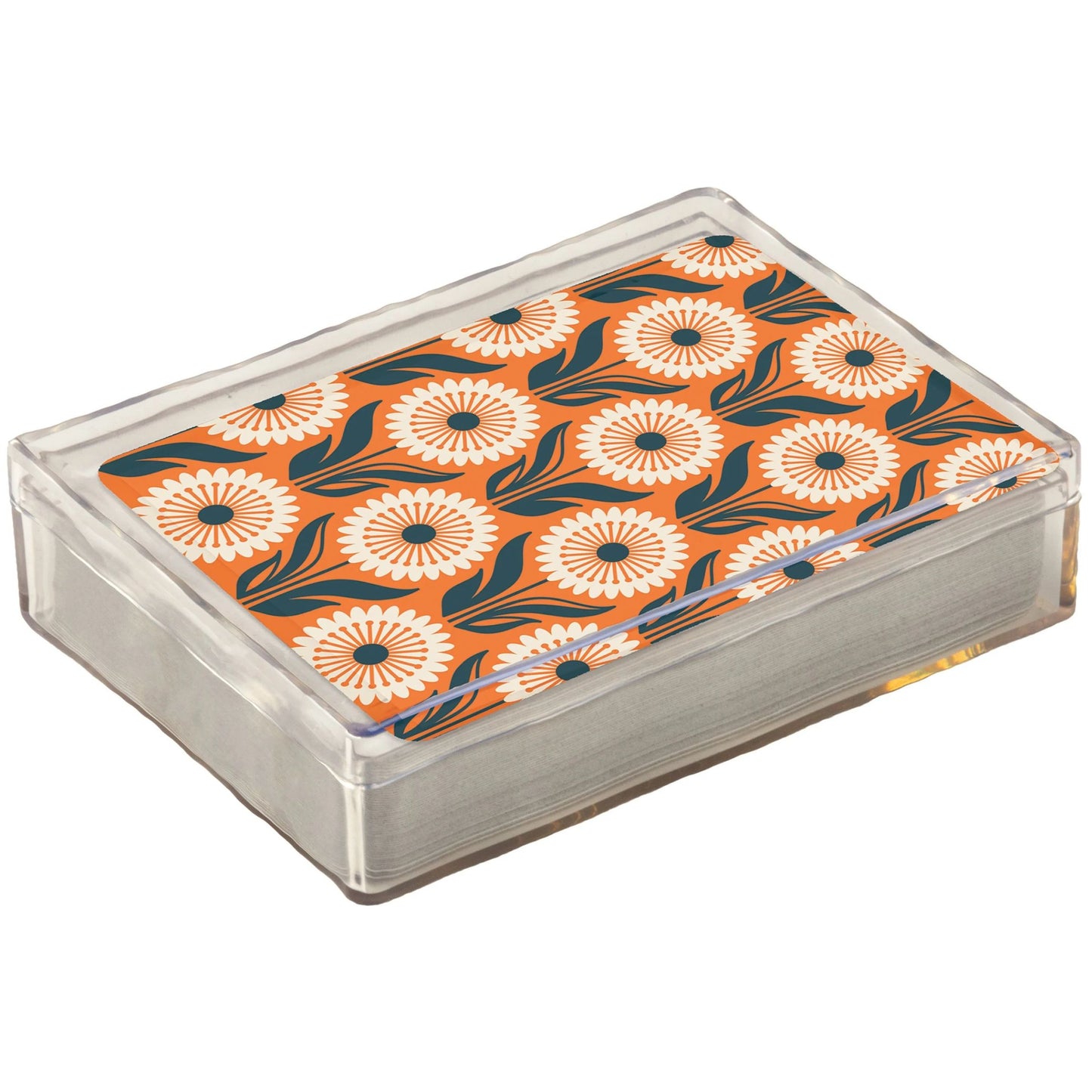 Playing cards with floral design on an orange background