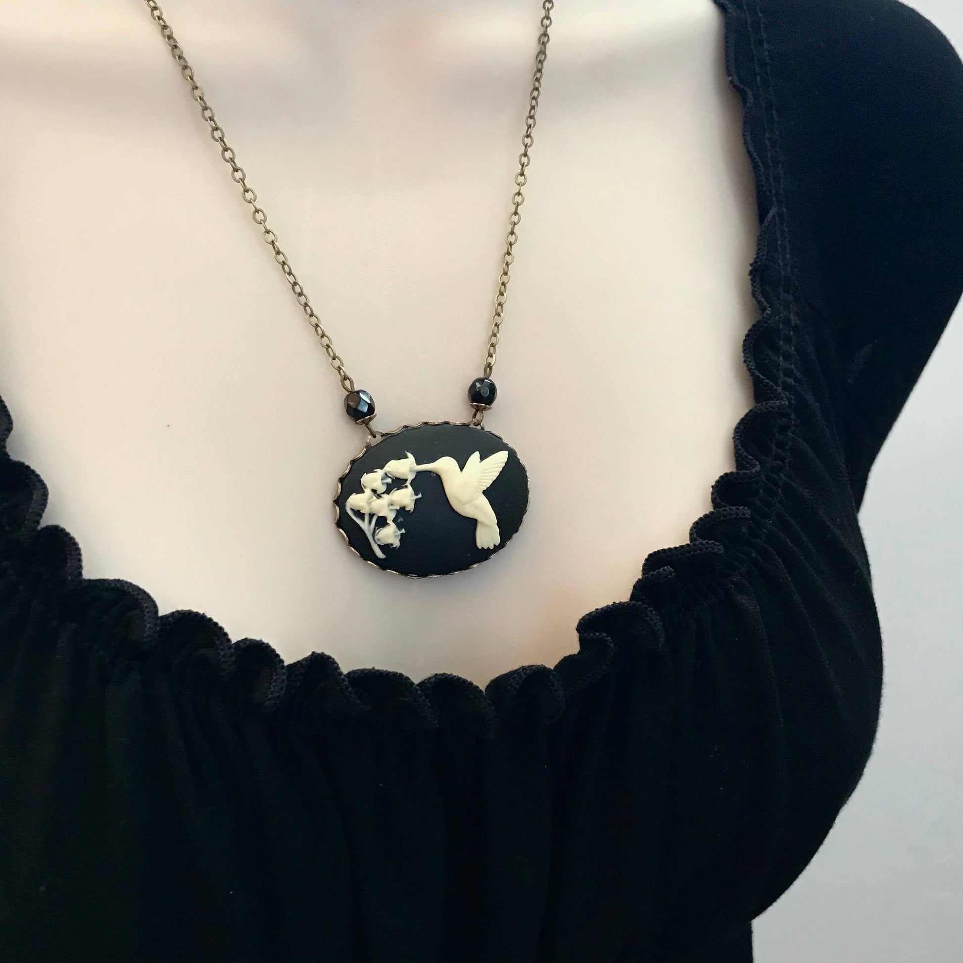 Hummingbird Cameo Necklace in Black and Ivory | Bird Cameo Lily of the Valley Flowers