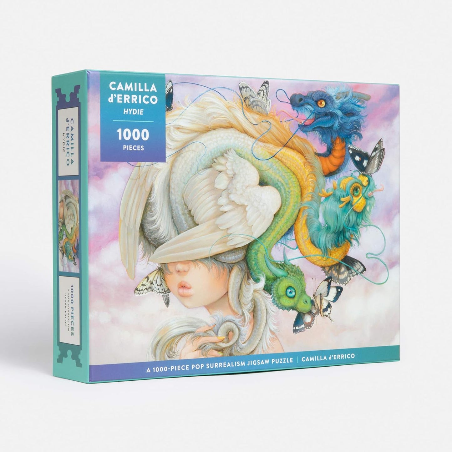 Jigsaw puzzle box with a colorful design featuring a woman with a dragon on her head, brand 'Camilla d'Errico', and '1000 pieces' text.