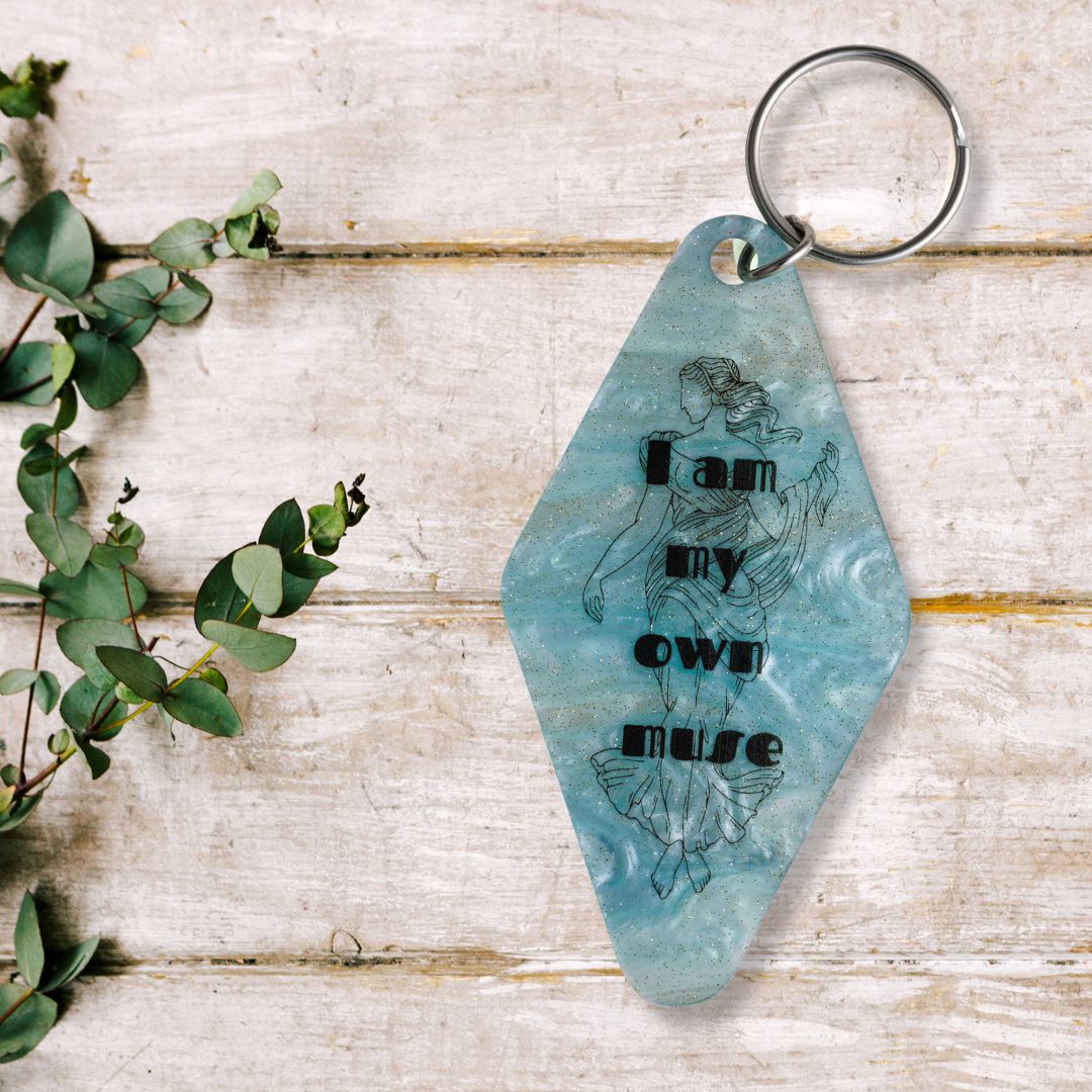 I Am My Own Muse Goddess Motel Keychain in Pearl Blue Marble