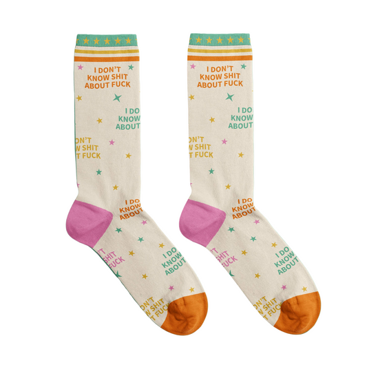 Pair of socks with colorful text and star patterns on a white background