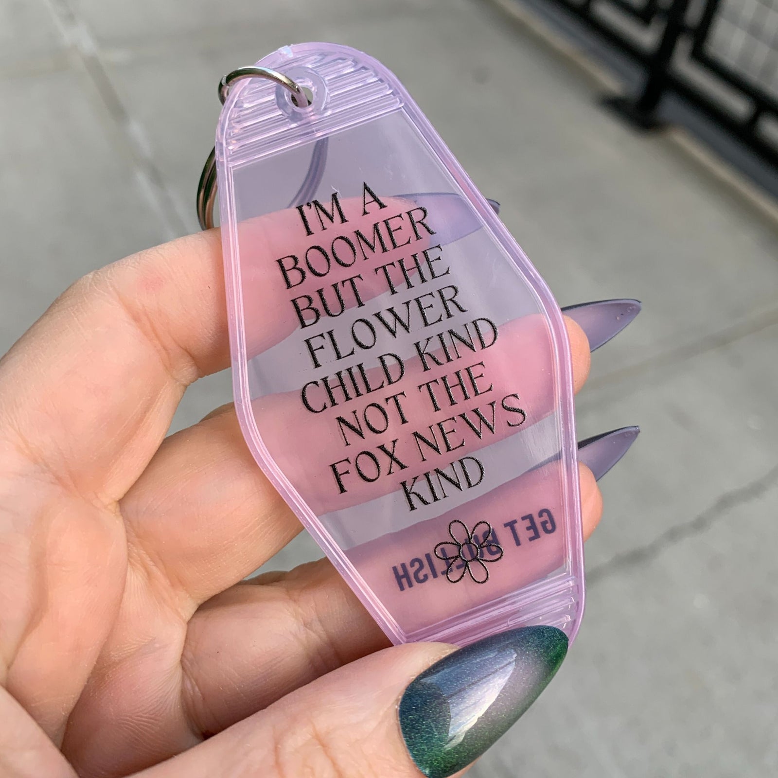 I’m a Boomer But Not the Fox News Kind Motel Style Keychain in Translucent Pink