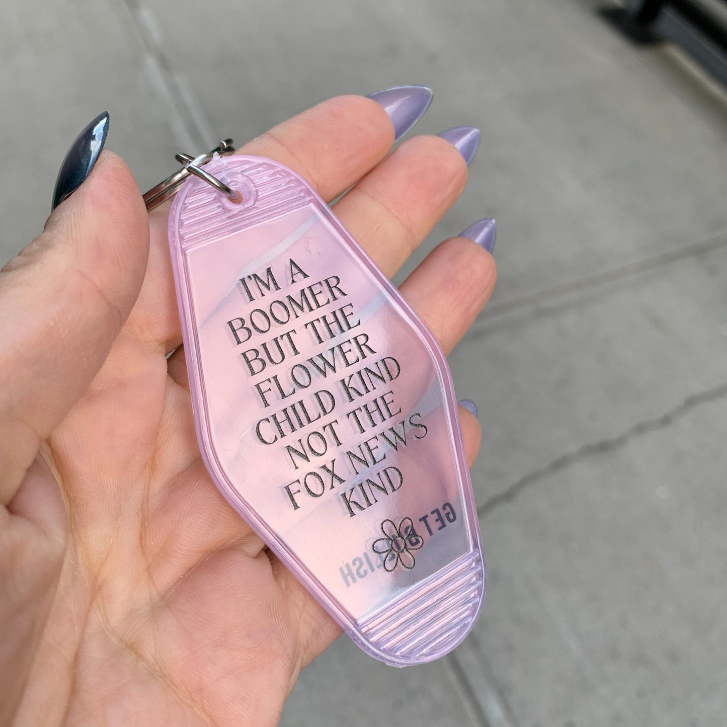 I’m a Boomer But Not the Fox News Kind Motel Style Keychain in Translucent Pink