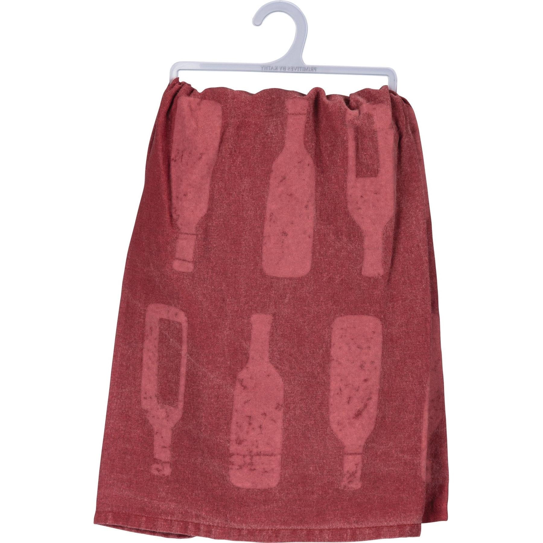Red dish towel with bottle pattern on a white background