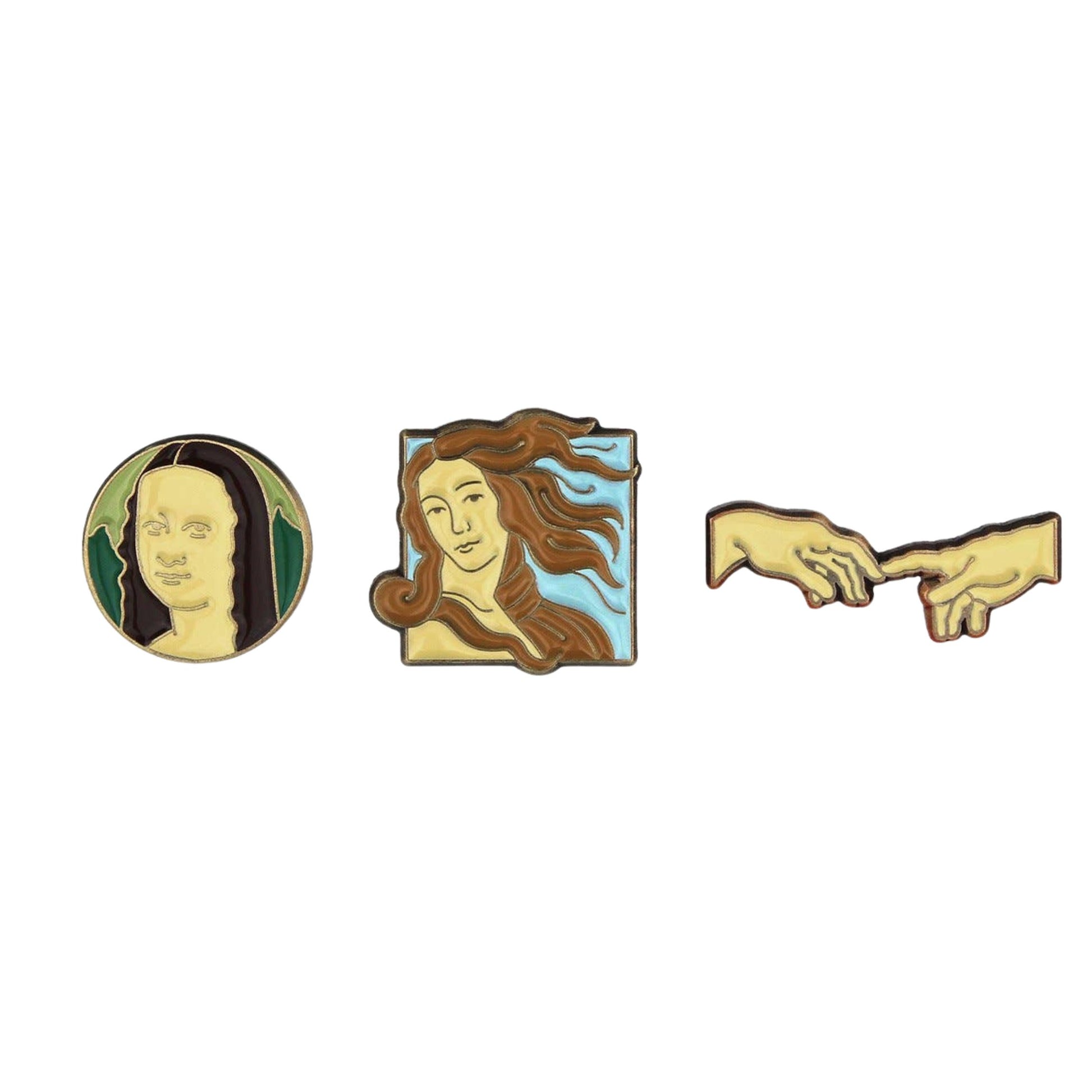 Three pins featuring artistic depictions on a white background