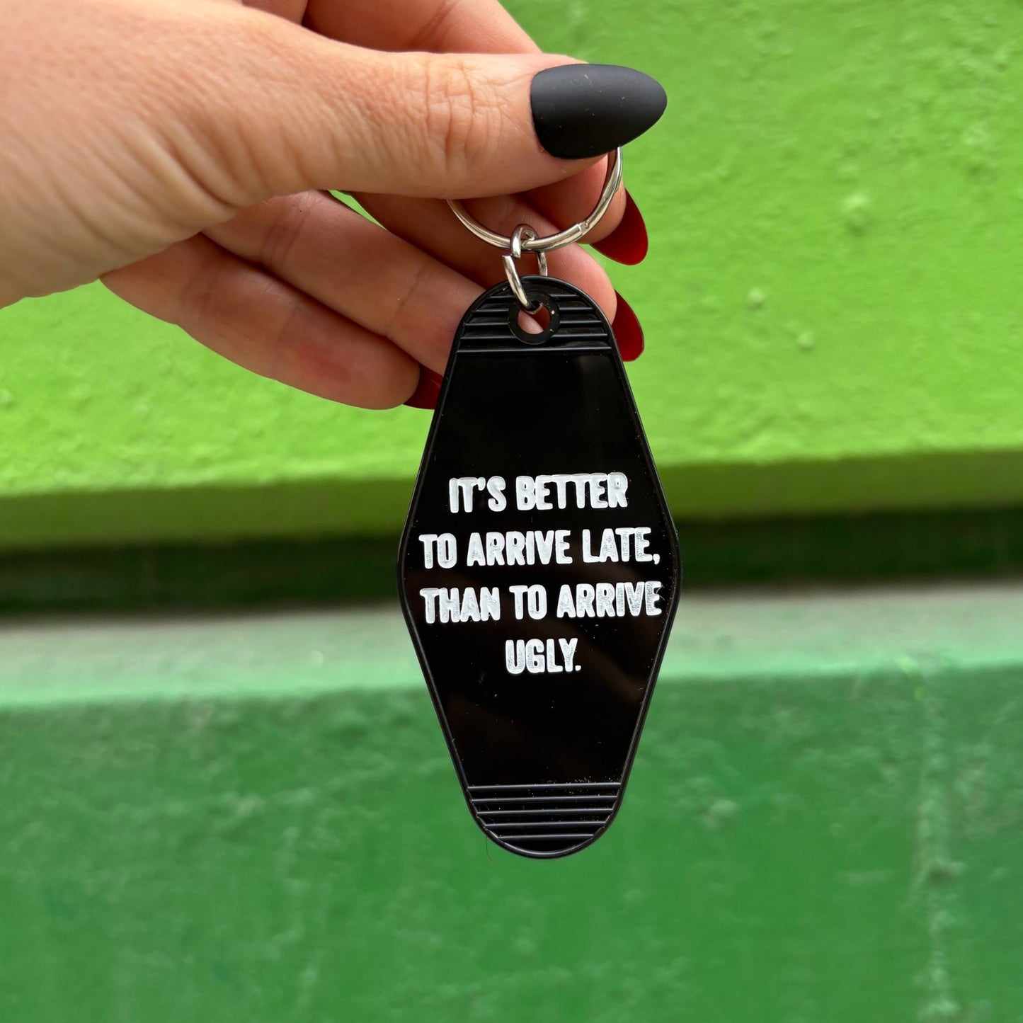 It's Better To Arrive Late, Than To Arrive Ugly Keychain in Black and White