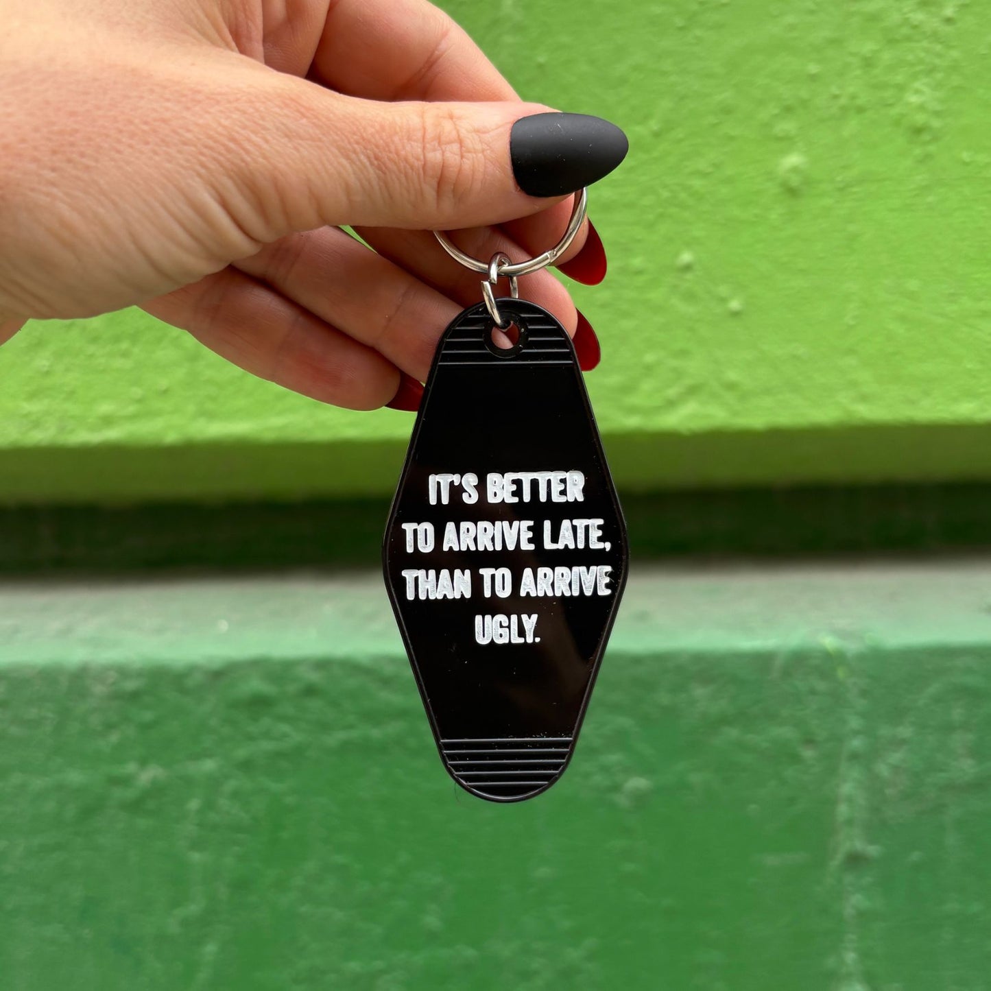 It's Better To Arrive Late, Than To Arrive Ugly Keychain in Black and White