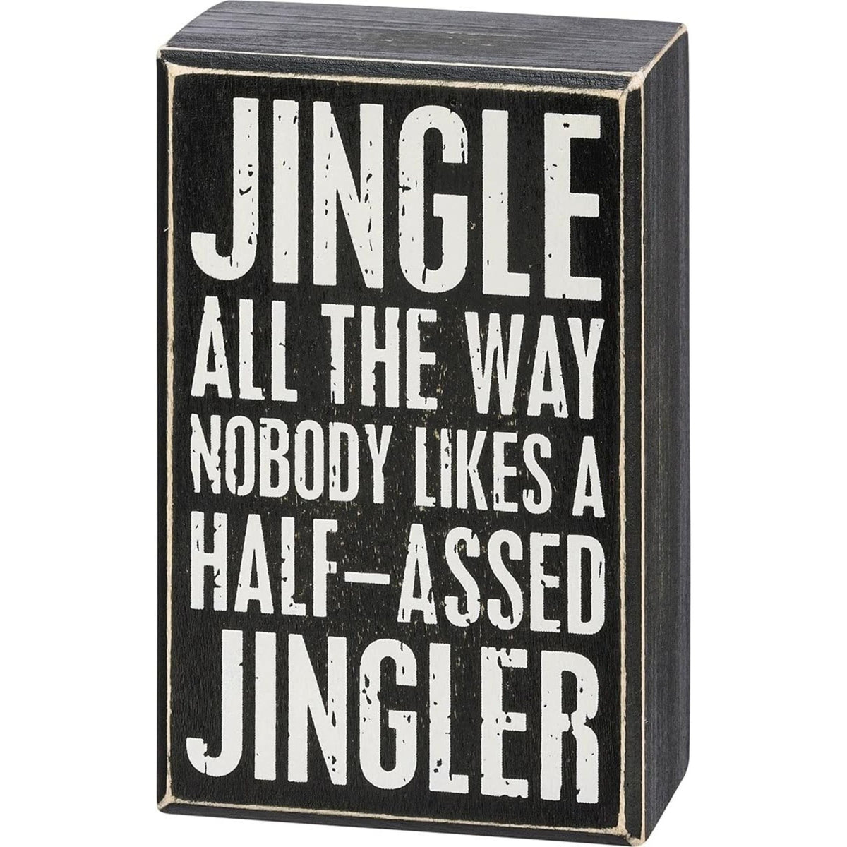 Black box sign with white text 'JINGLE ALL THE WAY NOBODY LIKES A HALF-ASSED JINGLER' on a white background