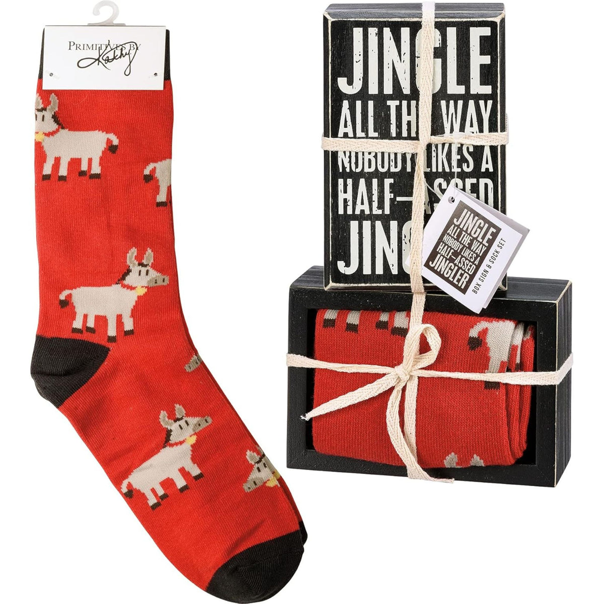 Red socks with donkey pattern and 'Jingle All the Way' wooden box sign