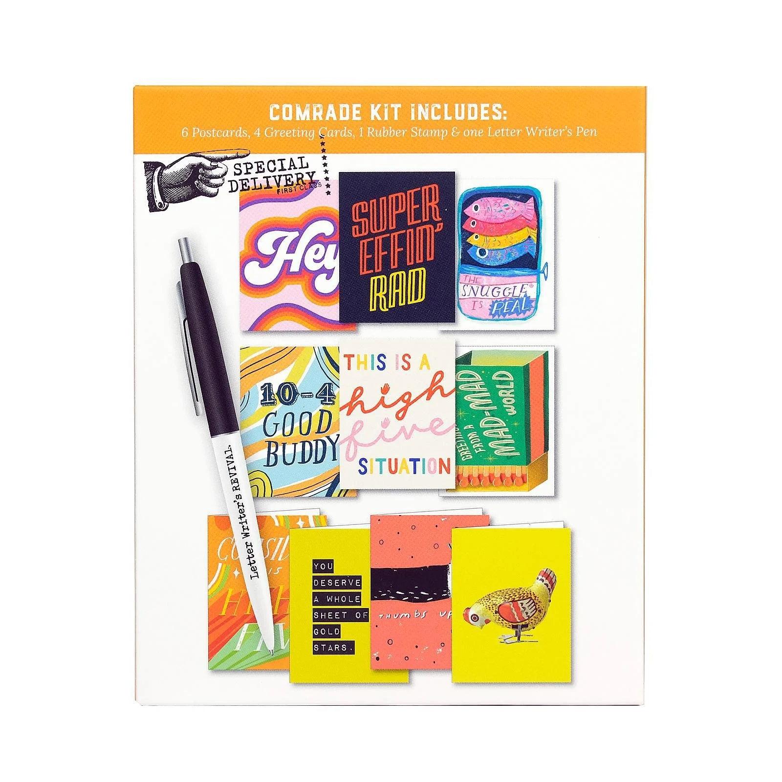 Comrade Kit with colorful cards and a pen on a white background