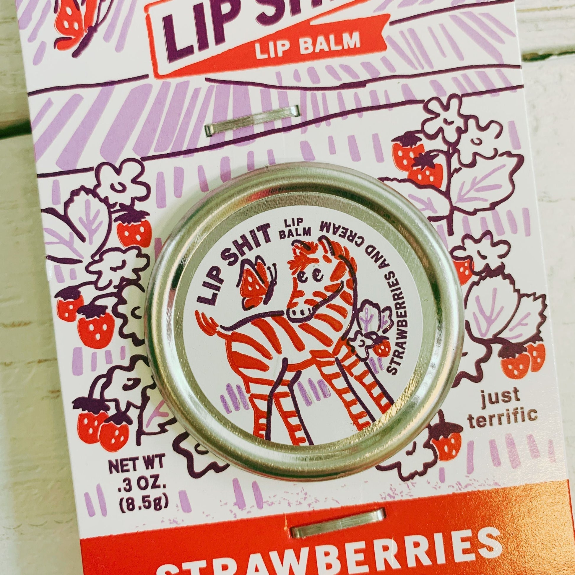 Lip Shit Lip Balm in Strawberries And Cream | Lip Moisturizer in Tin | .3oz | BlueQ at GetBullish