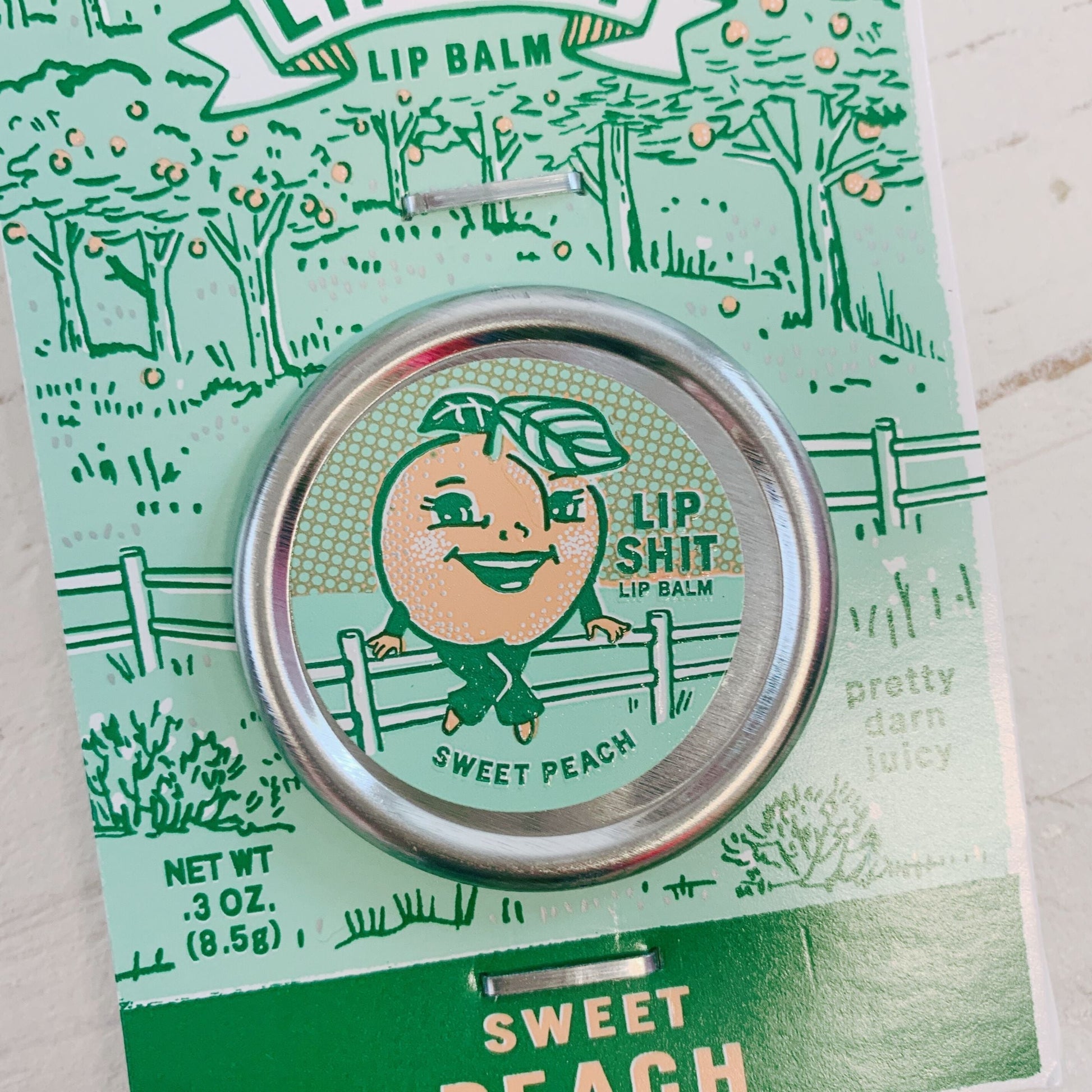 Lip Shit Lip Balm in Sweet Peach | Lip Moisturizer in Tin | .3oz | BlueQ at GetBullish