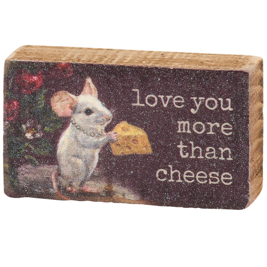 Wooden block with a mouse holding cheese and text 'love you more than cheese' on a white background