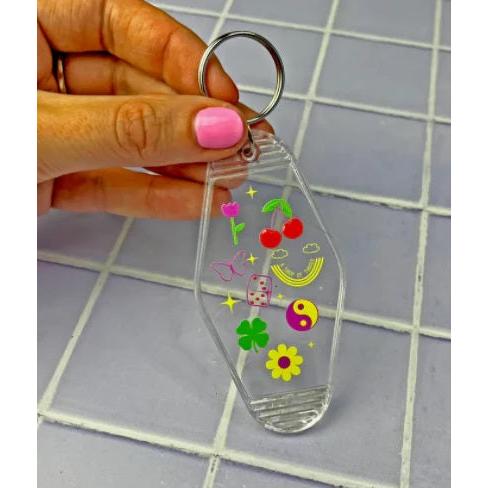 Lucky Charm Motel Keychain in Transparent Clear