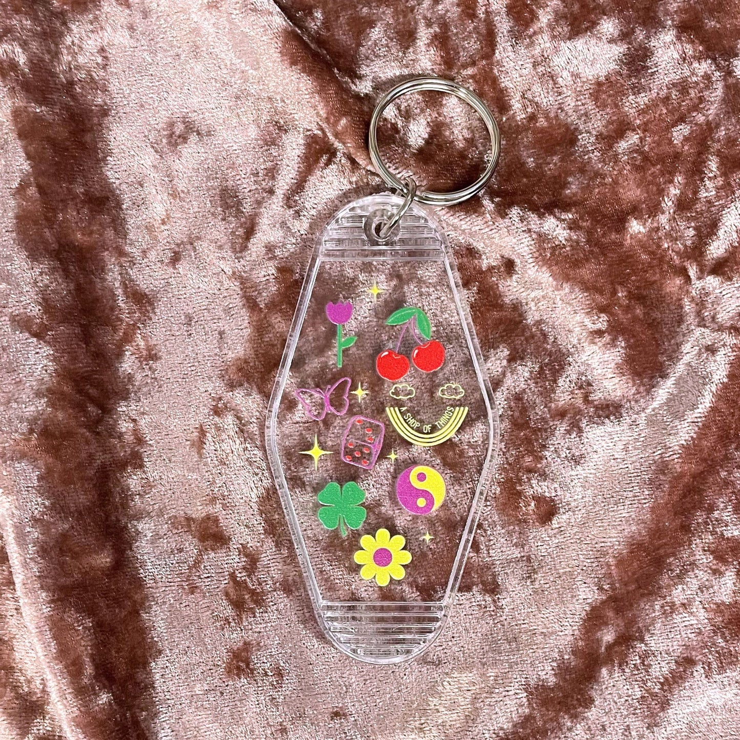 Lucky Charm Motel Keychain in Transparent Clear