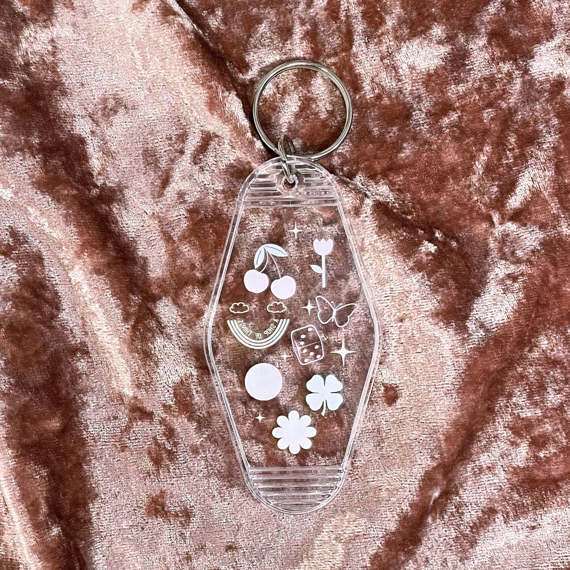 Lucky Charm Motel Keychain in Transparent Clear