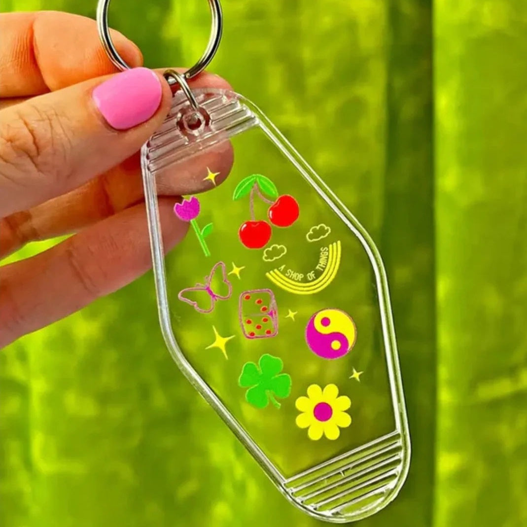 Lucky Charm Motel Keychain in Transparent Clear