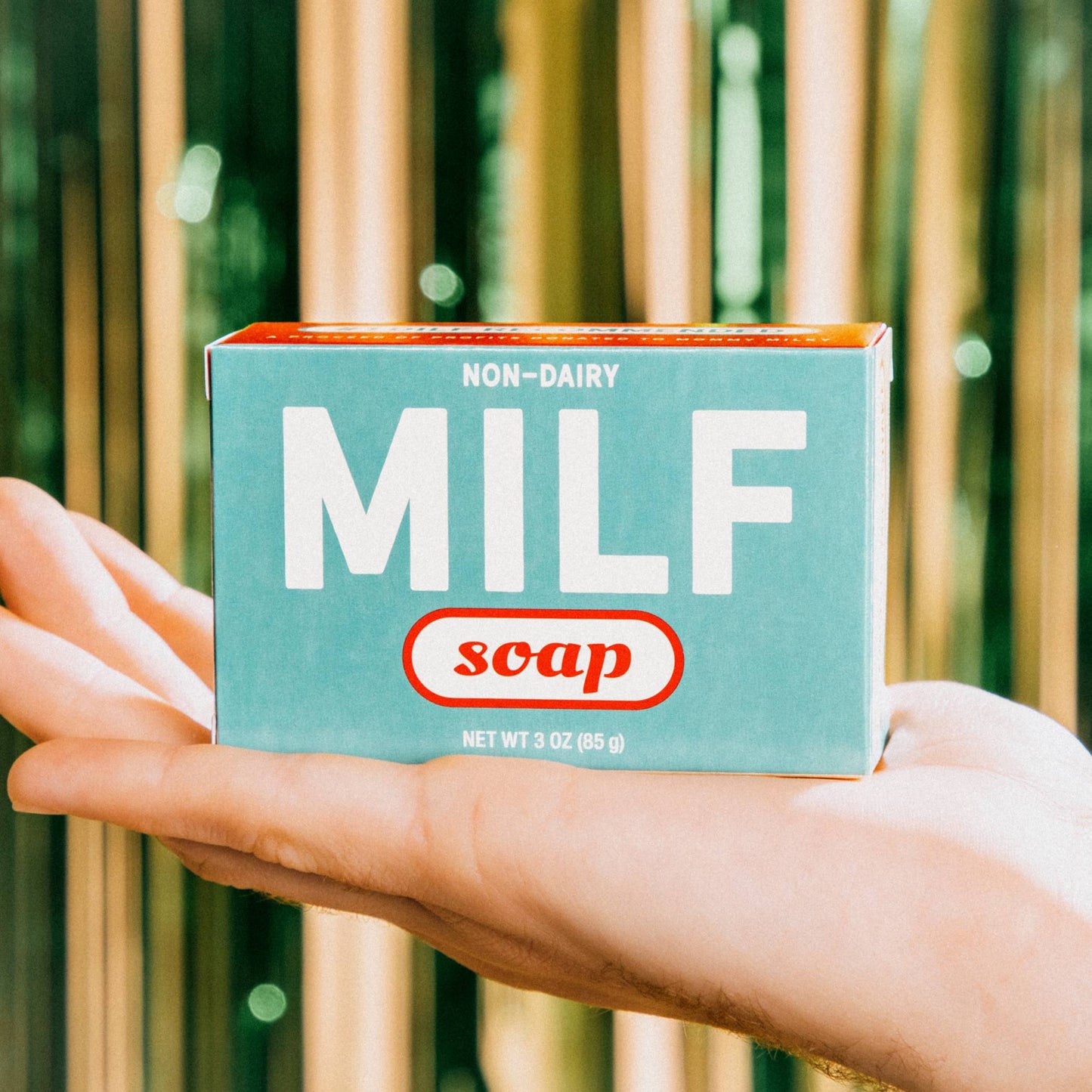 Box of 'MILF soap' held by a hand