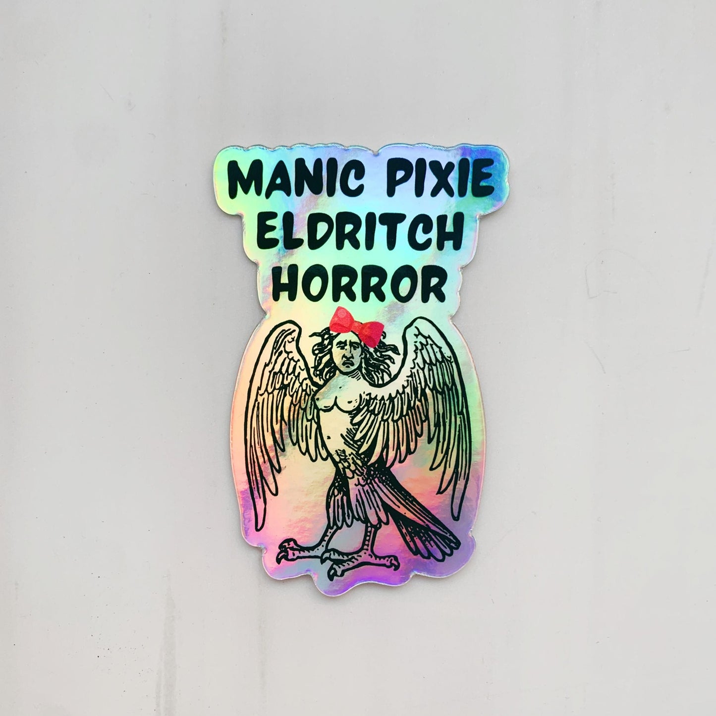 Manic Pixie Eldritch Horror Holographic Rainbow Vinyl Sticker | Vinyl Die Cut Decal