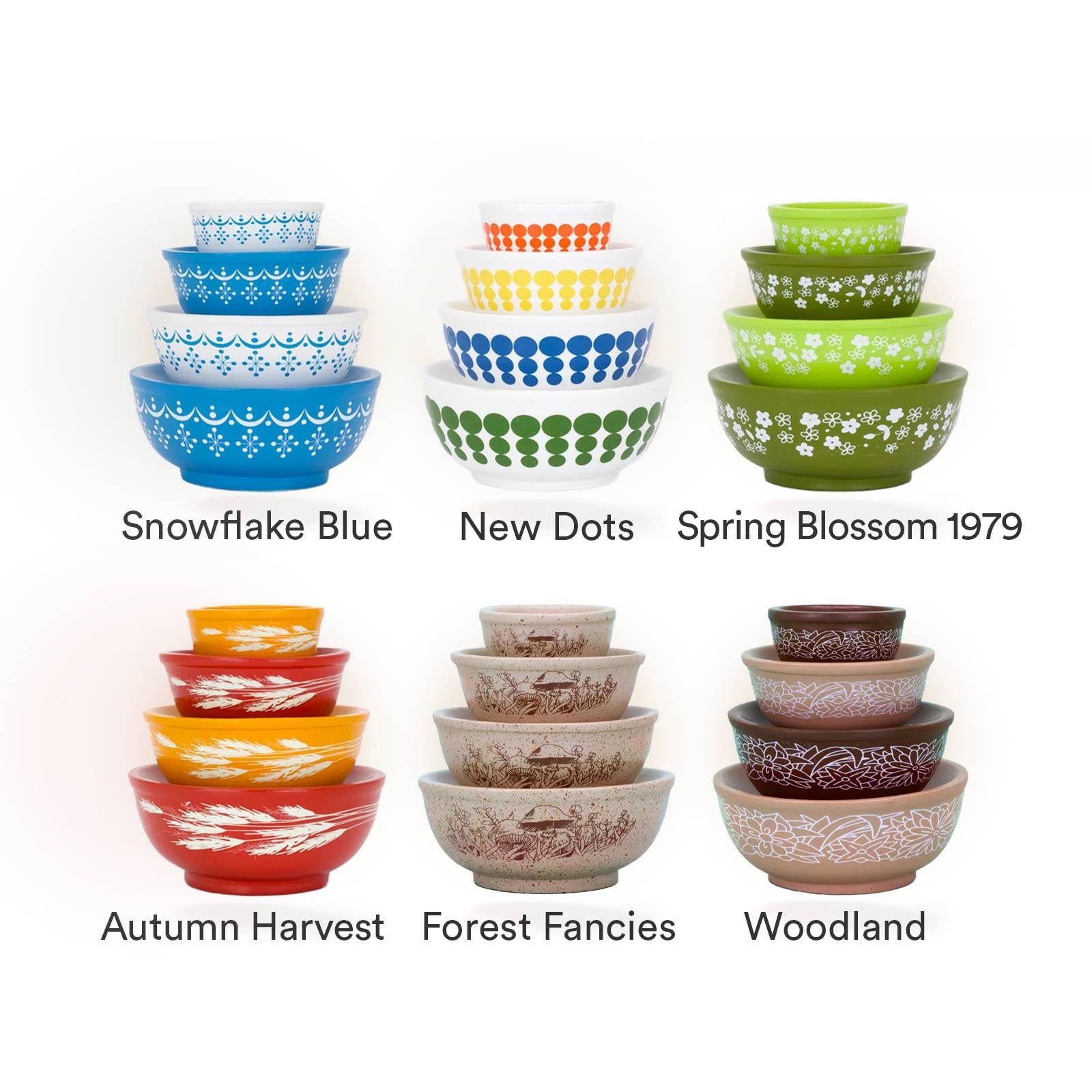 Set of colorful bowls with different patterns and color schemes on a white background.