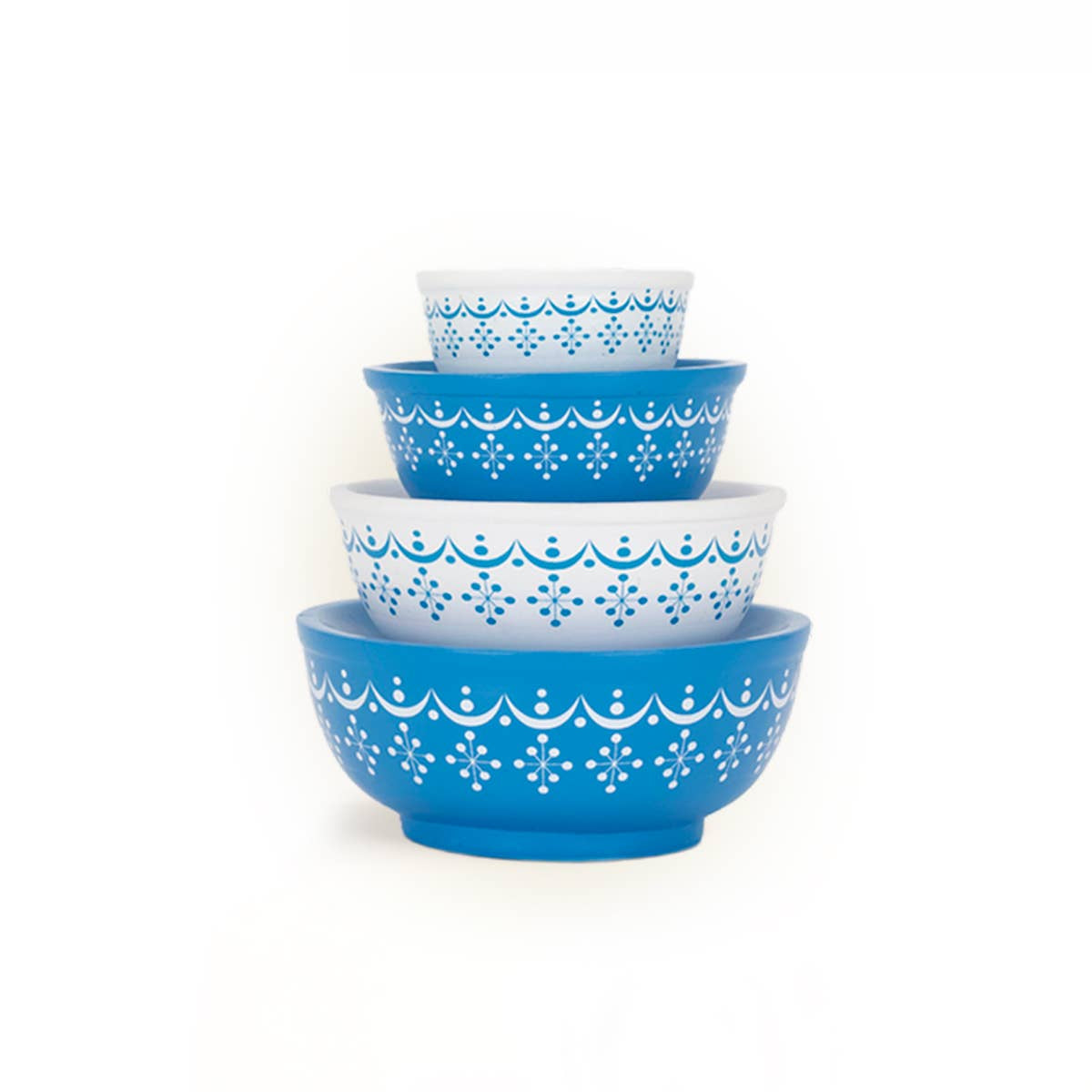 Set of four blue and white patterned bowls stacked on a white background
