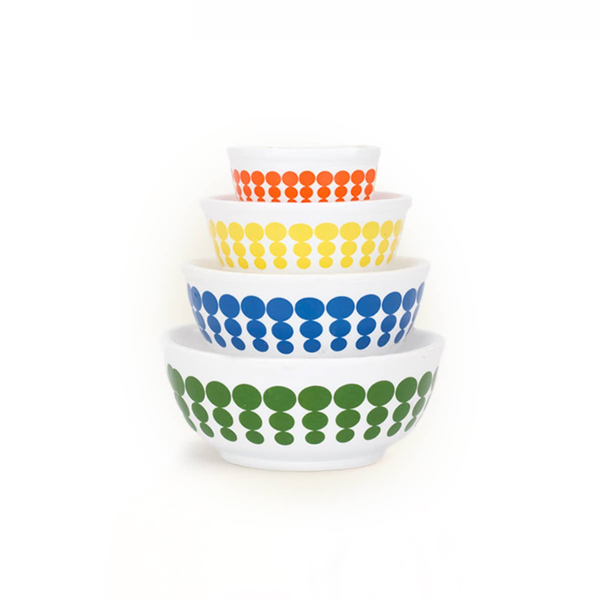 Set of four colorful polka dot bowls stacked on a white background