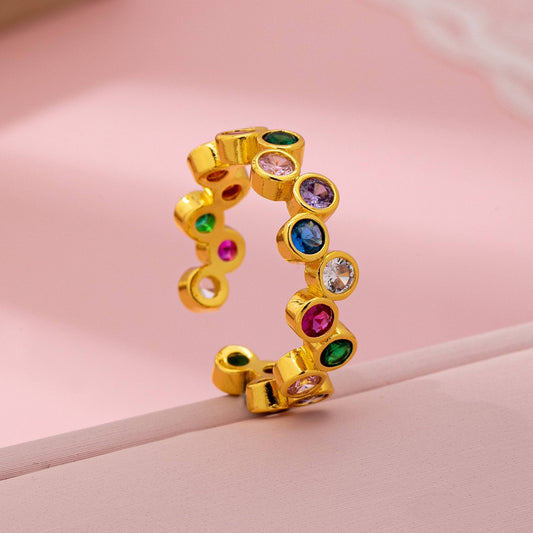 Gold ring with multicolored gemstones