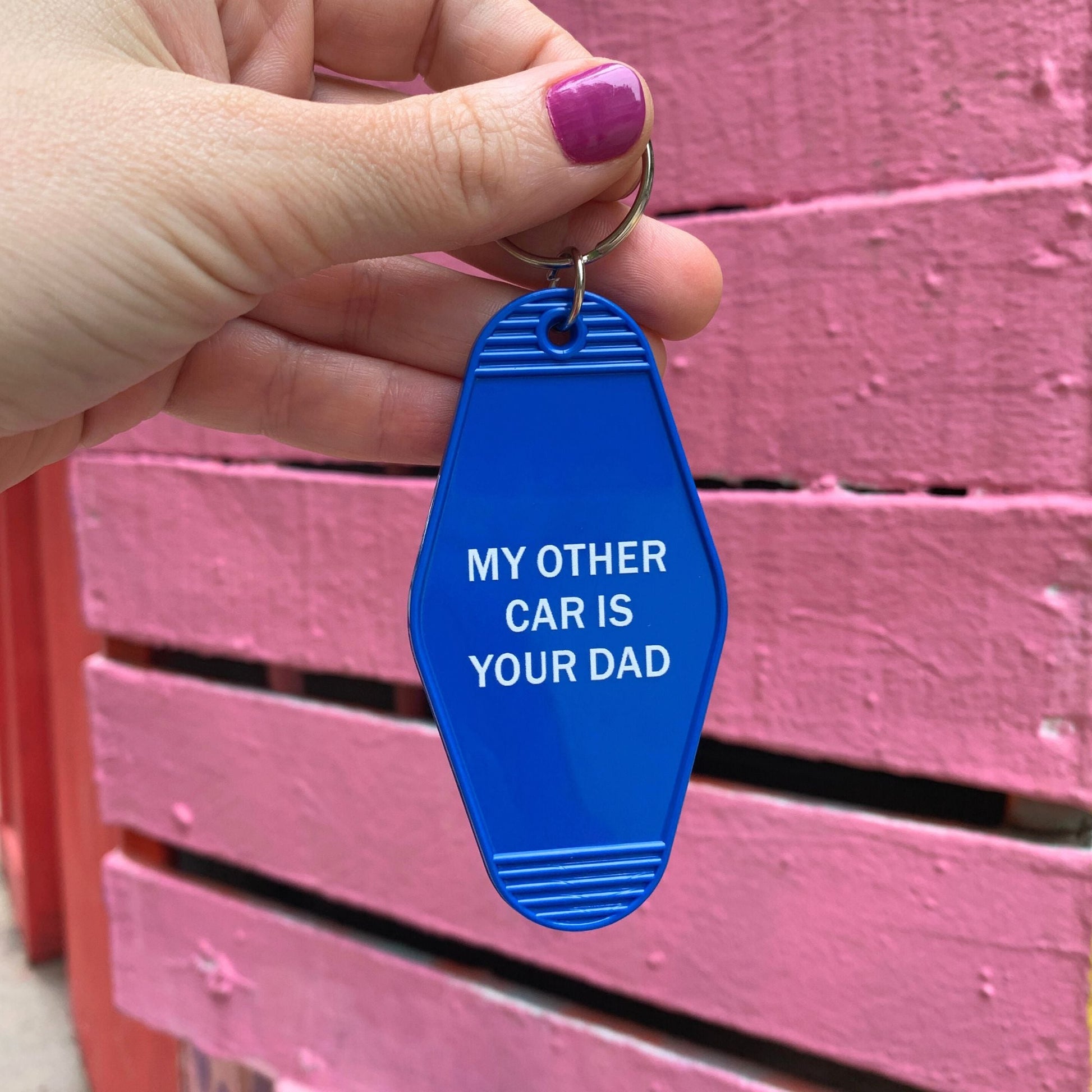 My Other Car Is Your Dad Motel Keychain in Blue